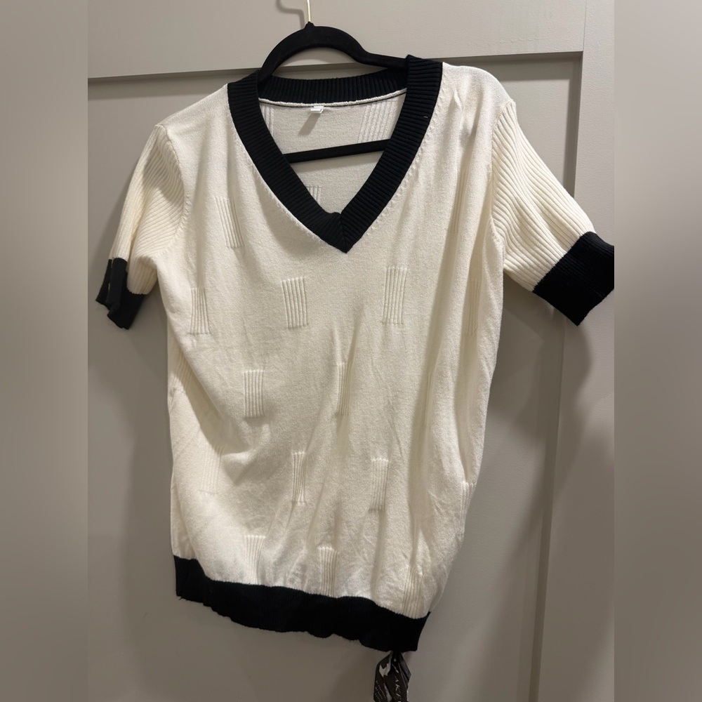 Black and White V-Neck Sweater with Button Sleeves